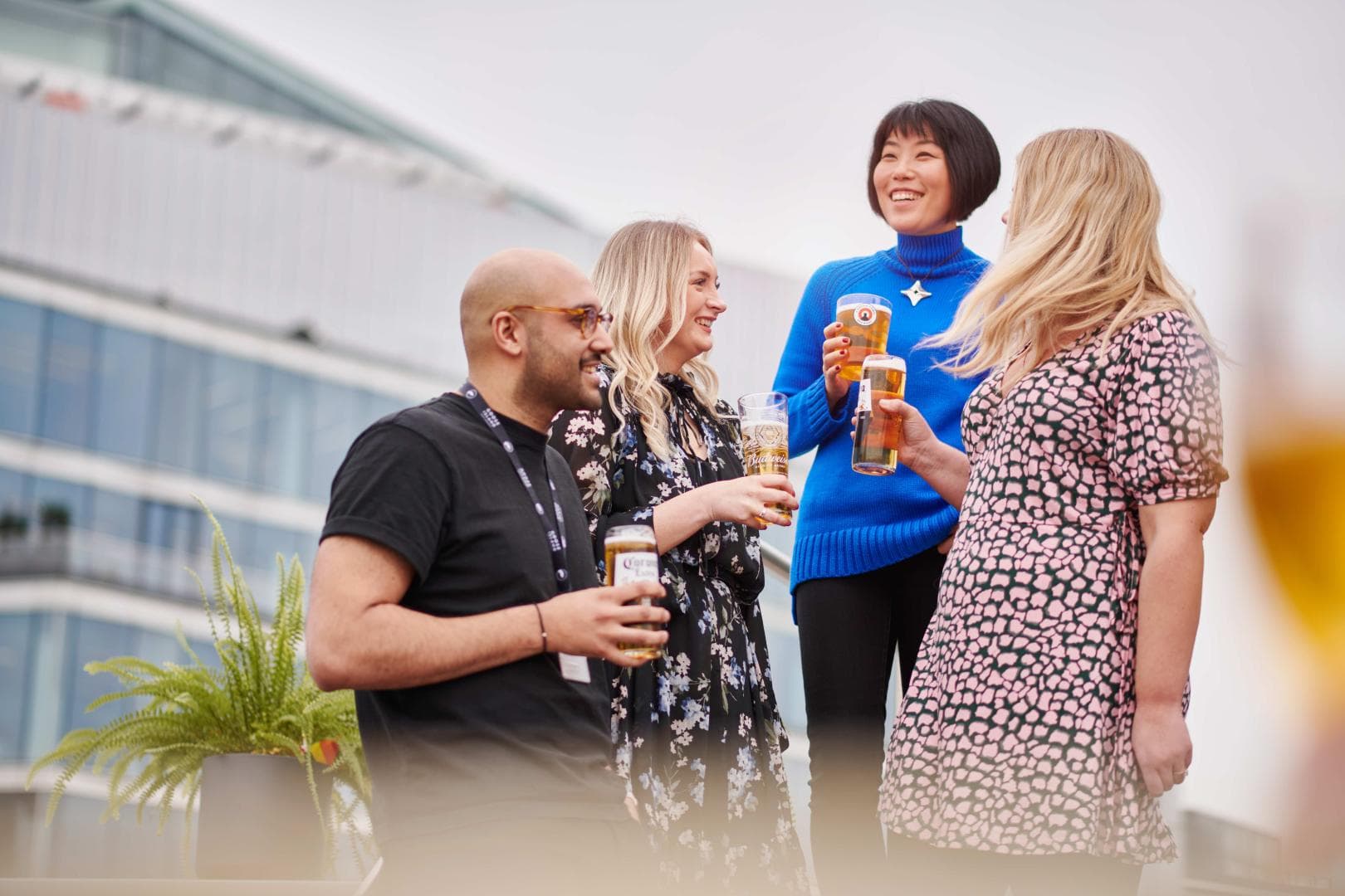 Group of people socialising with their drinks