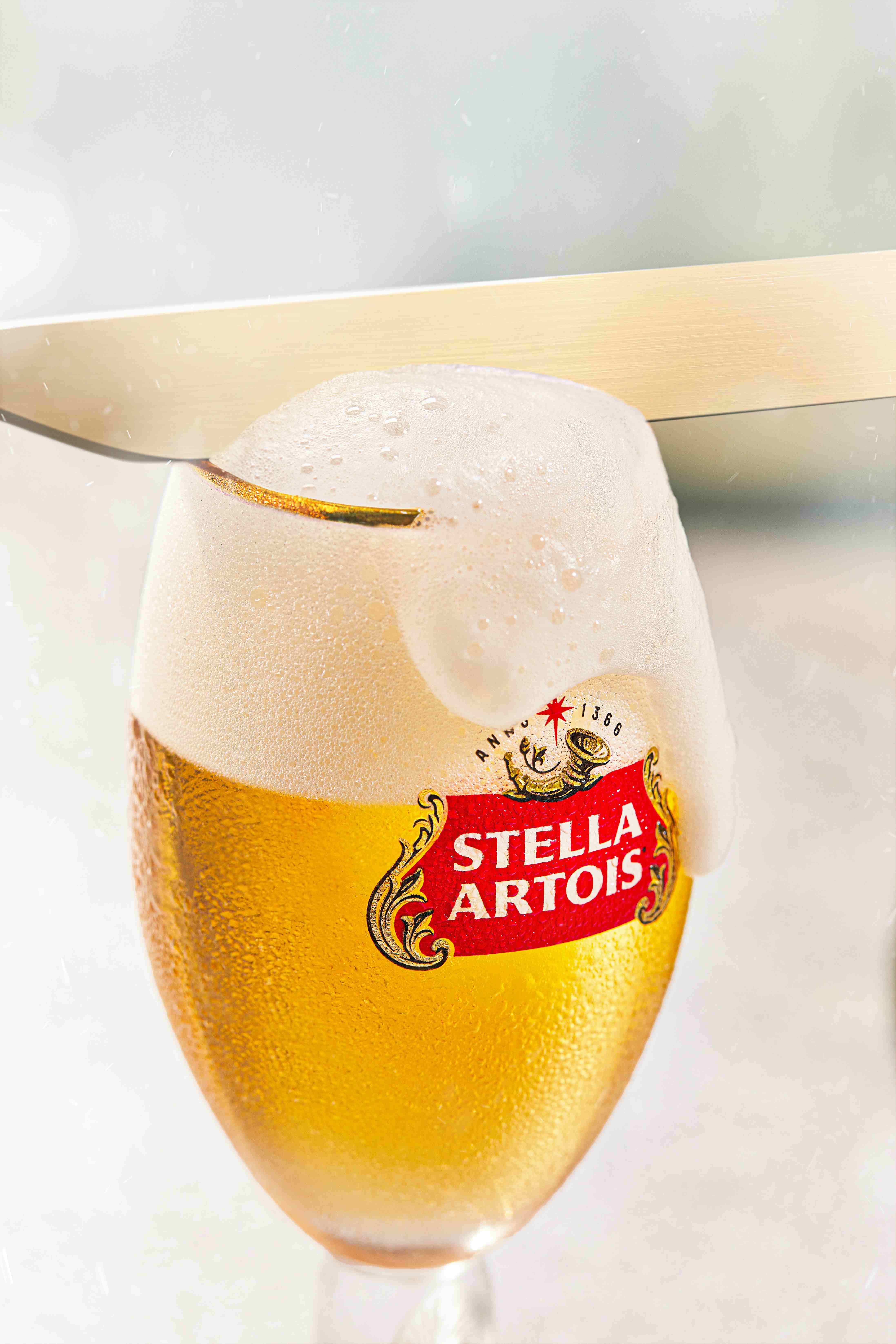 Image of Stella Artois pint glass with beer in 