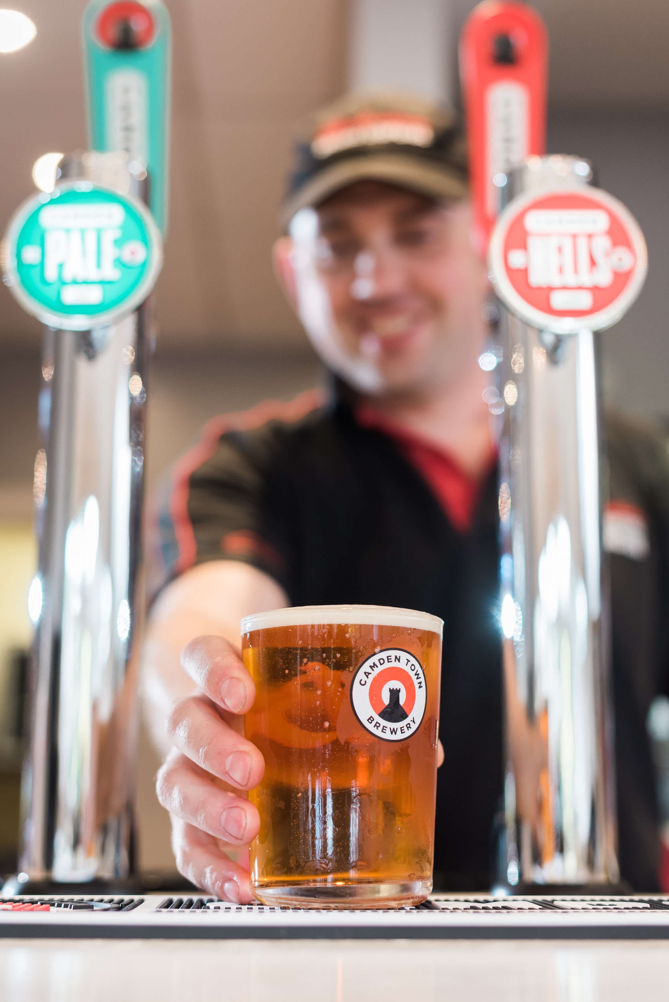 Camden Hells being poured at the bar